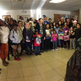 Group of people with gifts gathered