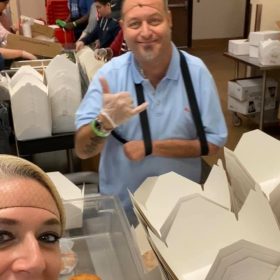 Volunteers preparing food donations.