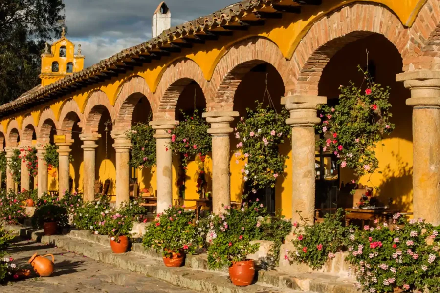 Beautiful hacienda style home with colonnade.