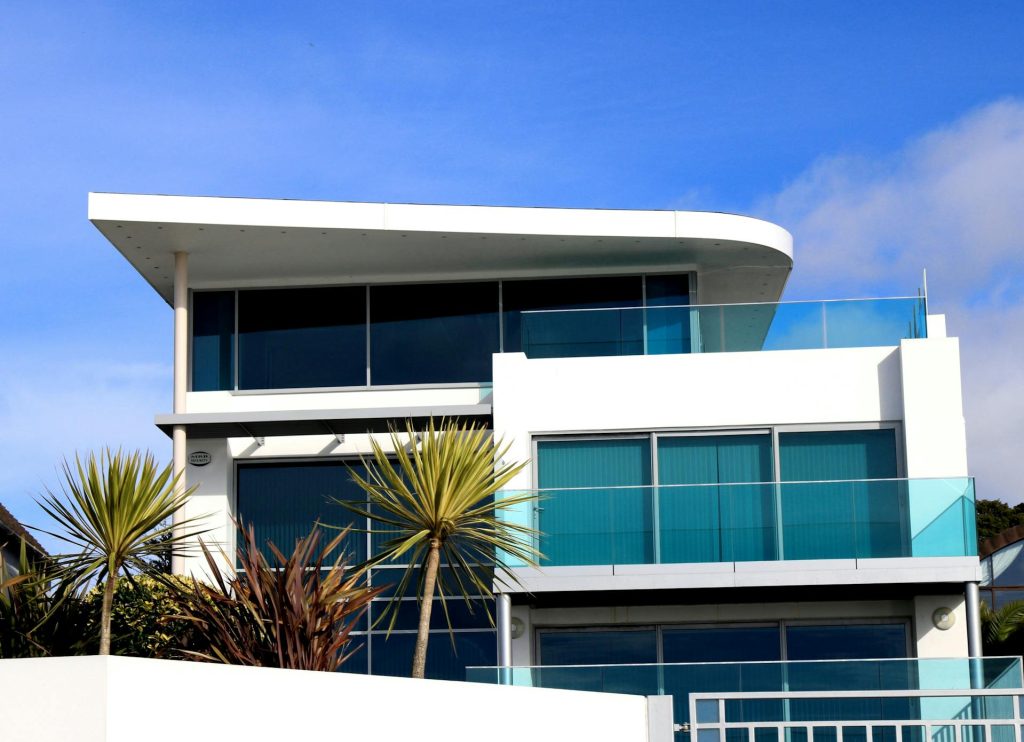 Beautiful modern luxury home symbolizing real estate timing