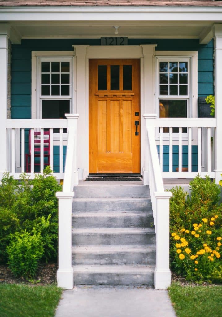 Charming house entrance with flowers.
