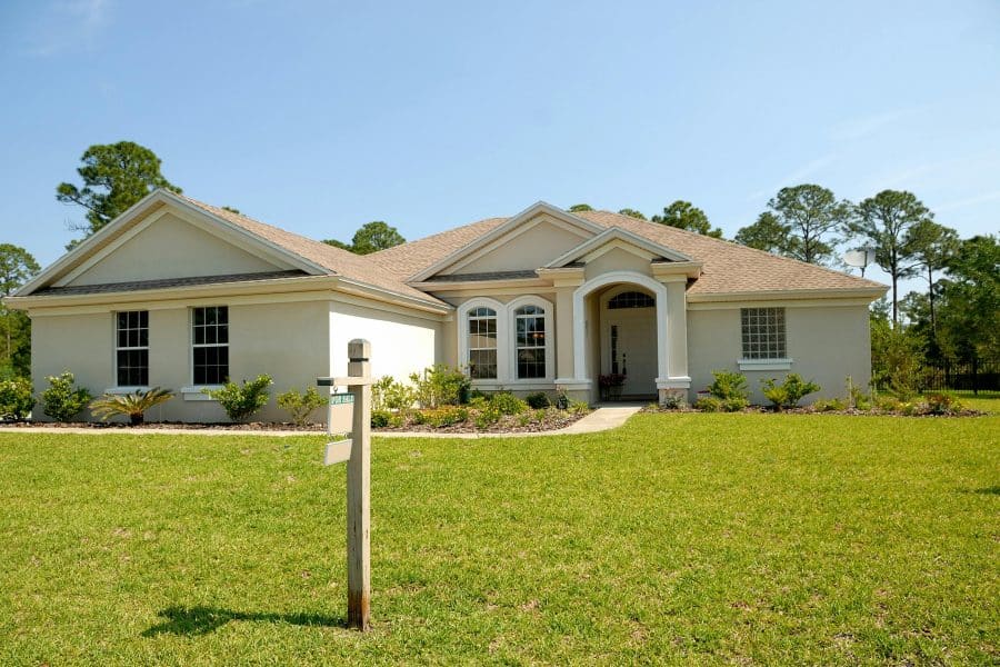 Single-story house with green lawn